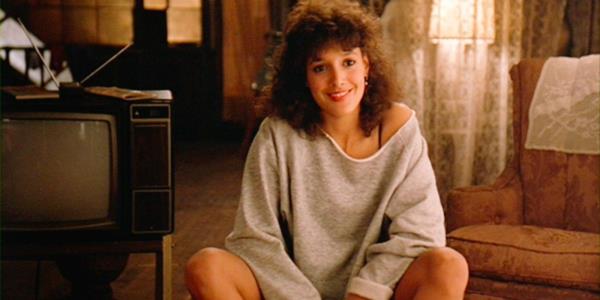 Jennifer Beals wearing the ico<em></em>nic sweatshirt in Flashdance