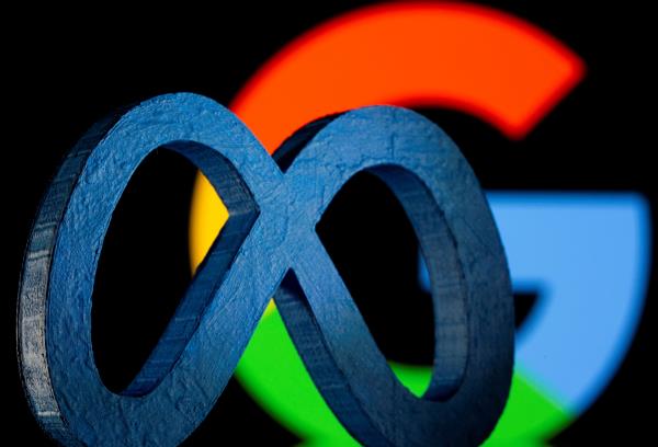 A 3D printed Facebook's new rebrand logo me<em></em>ta is seen in front of displayed Google logo in this illustration