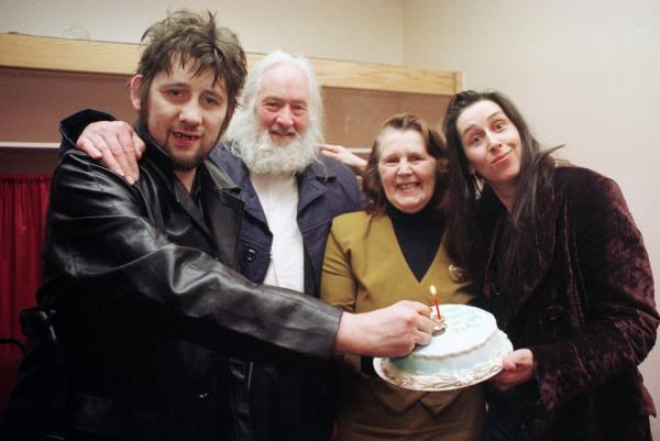 Shane with his dad Maurice, mum Therese and sister Siobhan at his 40th birthday.