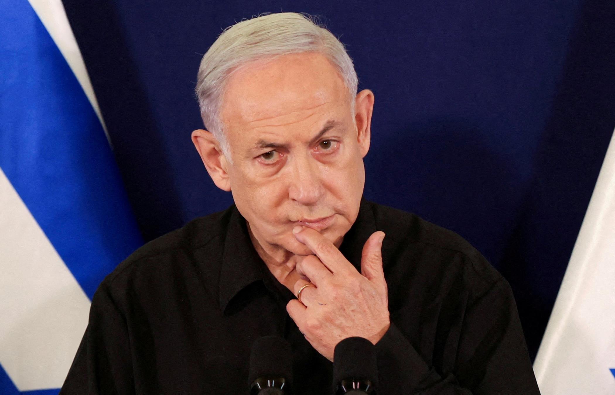 Israeli Prime Minister Benjamin Netanyahu speaks during a press co<em></em>nference with Defense Minister Yoav Gallant and Cabinet Minister Benny Gantz in the Kirya military ba<em></em>se, Tel Aviv , Israel, Oct. 28, 2023. (Reuters Photo)