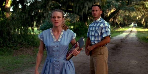 Tom Hanks as Forrest and Robin Wright as Jenny standing in the road in Forrest Gump