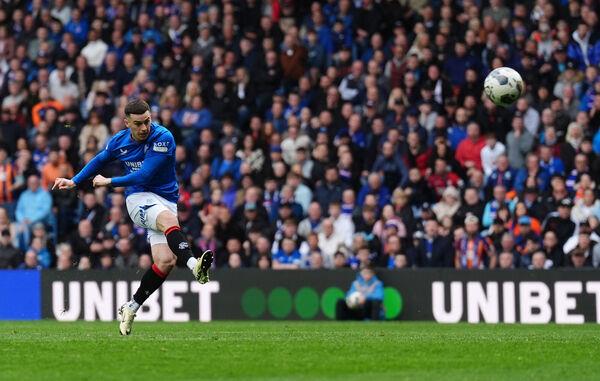Rangers' Tom Lawrence scoring their third goal of the game. Photo credit: Andrew Milligan/PA Wire.