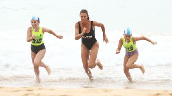 Former Iro<em></em>nWoman Candice Warner and daughters
