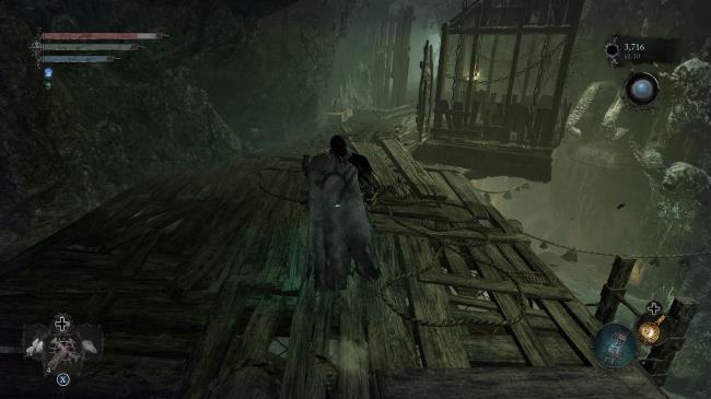 Player making his way to the lift on the right side Lords of the Fallen 