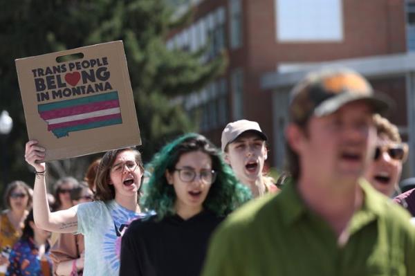 Transgender rights activists march through the University of Mo<em></em>ntana campus on May 3 in Missoula. Dozens were protesting the censure of transgender Mo<em></em>ntana state Rep. Zooey Zephyr, who was blocked from speaking after she said state legislators would have 