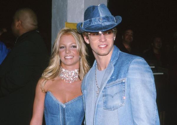 Britney Spears & Justin Timberlake of *NSYNC pictured in their ico<em></em>nic matching denim-on-denim ensembles.
