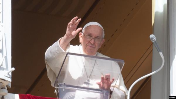 FILE - Pope Francis leads the Angelus prayer from his window, at the Vatican, Nov. 5, 2023. (Vatican Media/-Handout via Reuters) 