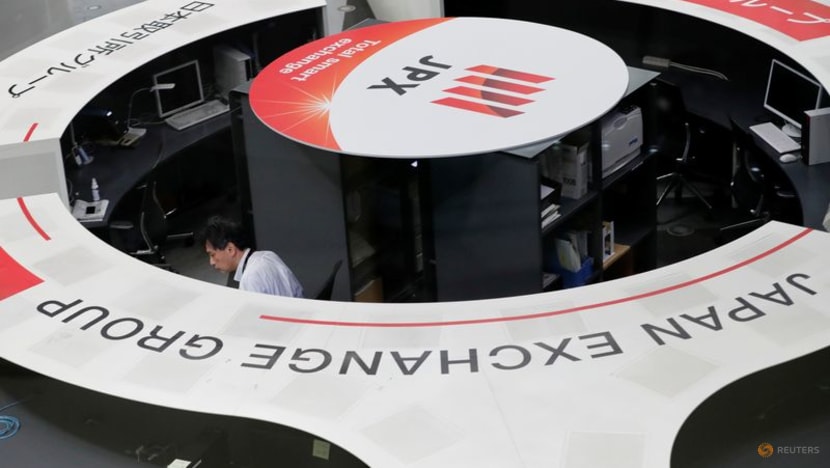 Japan's Nikkei retreats from 33-year high as sharp gains stoke caution