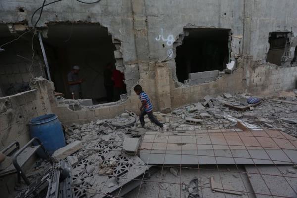 Civilians inspect Palestinian Hassan Katanani's 2-storey house, wher<em></em>e his family lives, after Israeli army demolished the house by planting explosives in Nablus, West Bank on October 29, 2023. (Photo by Nedal Eshtayah/Anadolu via Getty Images)