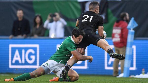 WINNING START: Debutant Joey Carbery of Ireland tackles TJ Perenara of New Zealand at Soldier Field in Chicago in 2016. Pic: Brendan Moran, Sportsfile