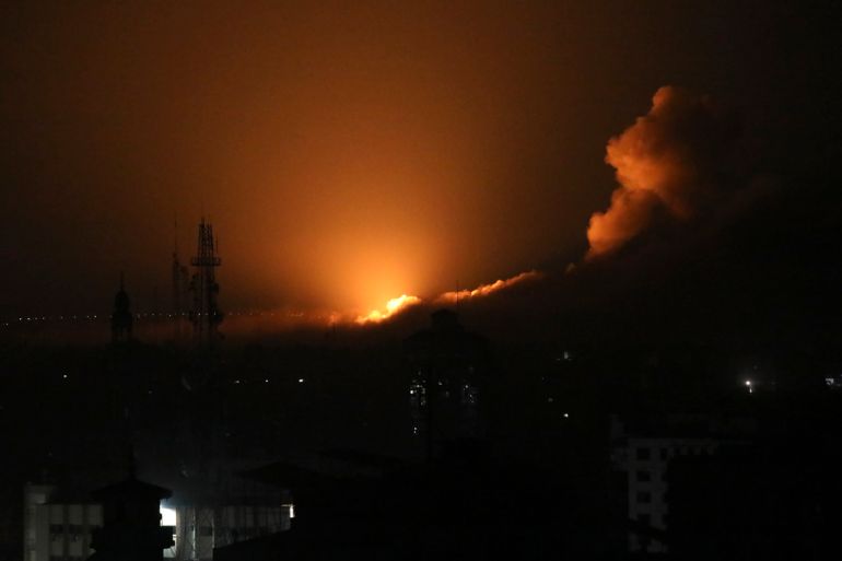 The night sky is lit up by Israeli airstrikes in Gaza